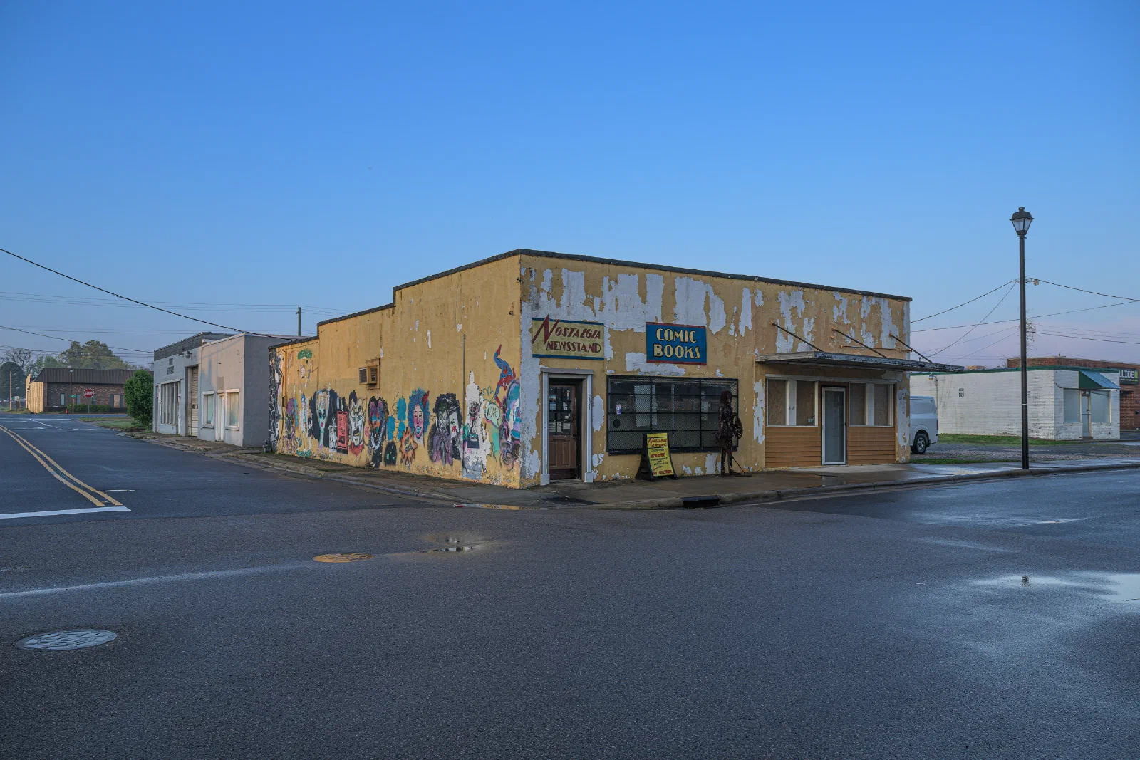Weathered comic book shop on a street corner